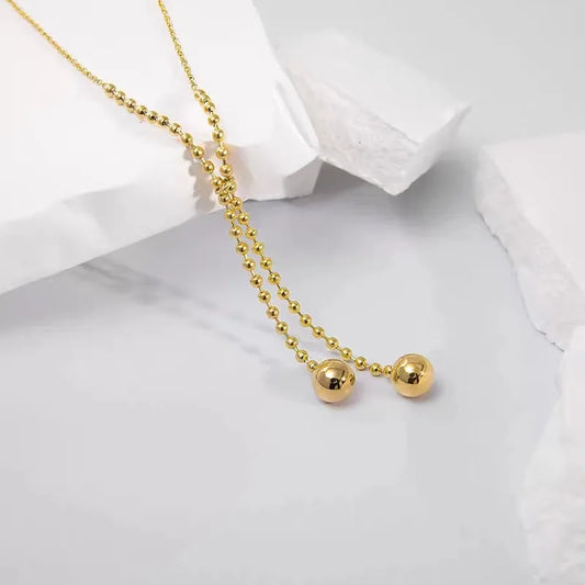 Gleaming Gold Dot Necklace